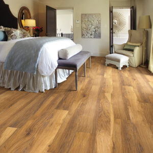 Laminate flooring in modern bedroom | Pierce Carpet Mill Outlet