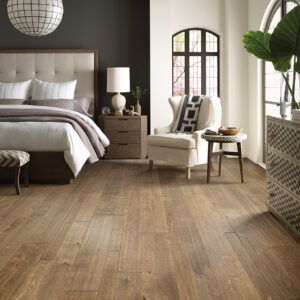 Laminate flooring in luxury bedroom | Pierce Carpet Mill Outlet