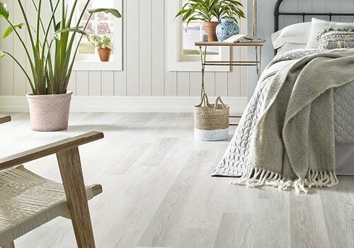 Luxury vinyl flooring in bedroom | Pierce Carpet Mill Outlet