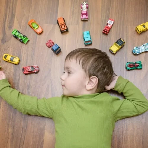 lv_cm_vinyl Kid with toys | Pierce Carpet Mill Outlet